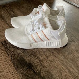 White and rose gold adidas NMD’s